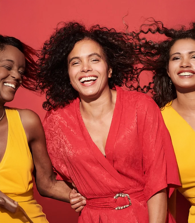 Happy diverse women laughing and enjoying life